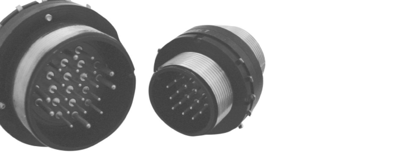 Archived source photo showing two P-C wall-through connector configurations