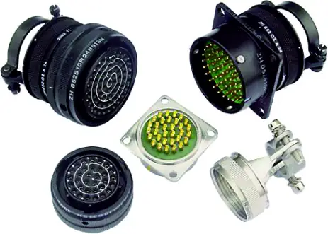 Archived catalog photograph showing a mixed group of circular connector configurations